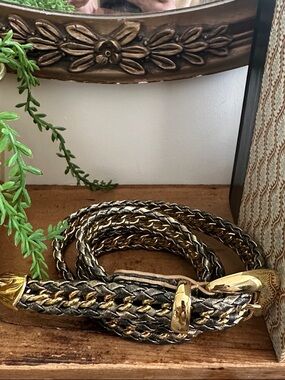 Braided Metallic Belt with Gold Tone Chain Intertwined and Buckle Hardware.